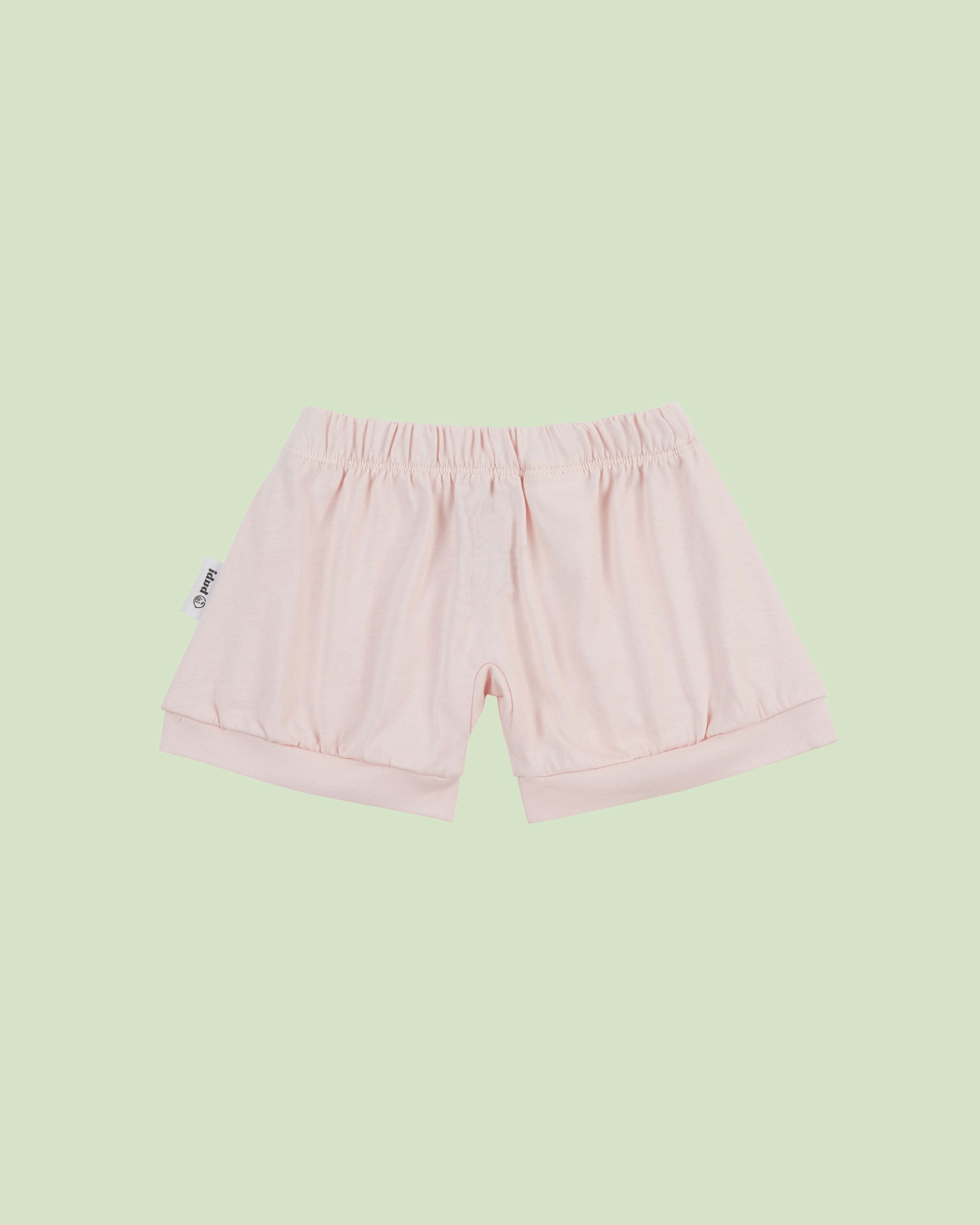 organic cotton baby shorts in pink - front view