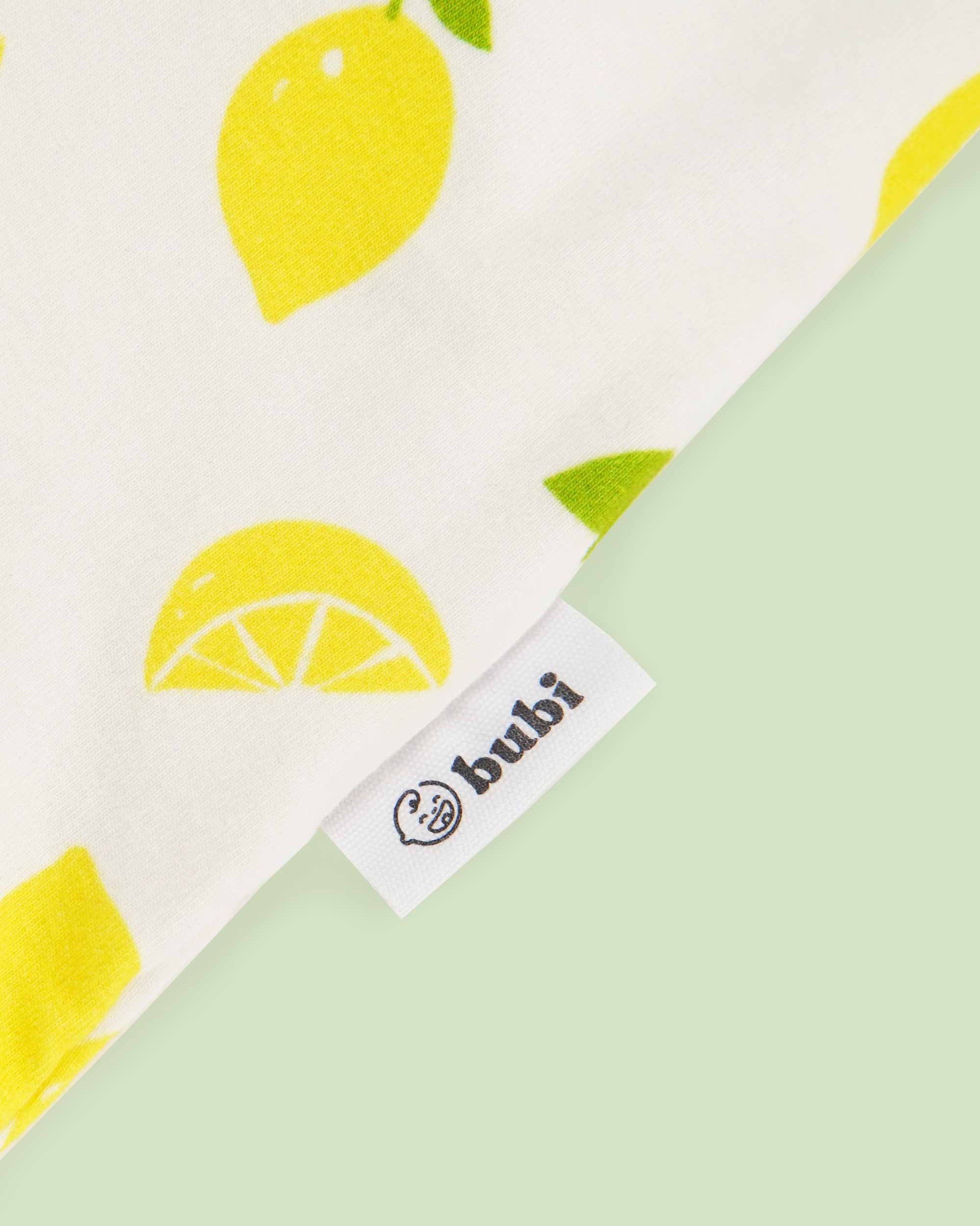 organic cotton bodysuit top lemons - close-up logo view