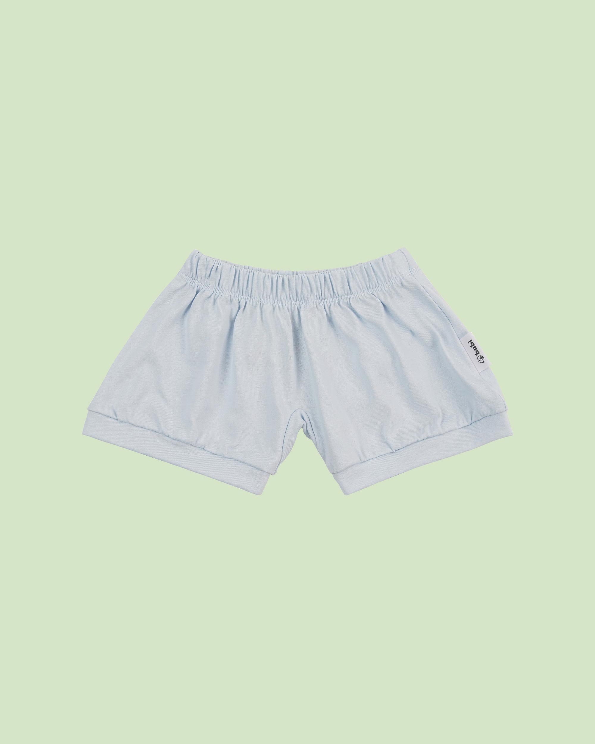 organic cotton baby shorts in blue - front view