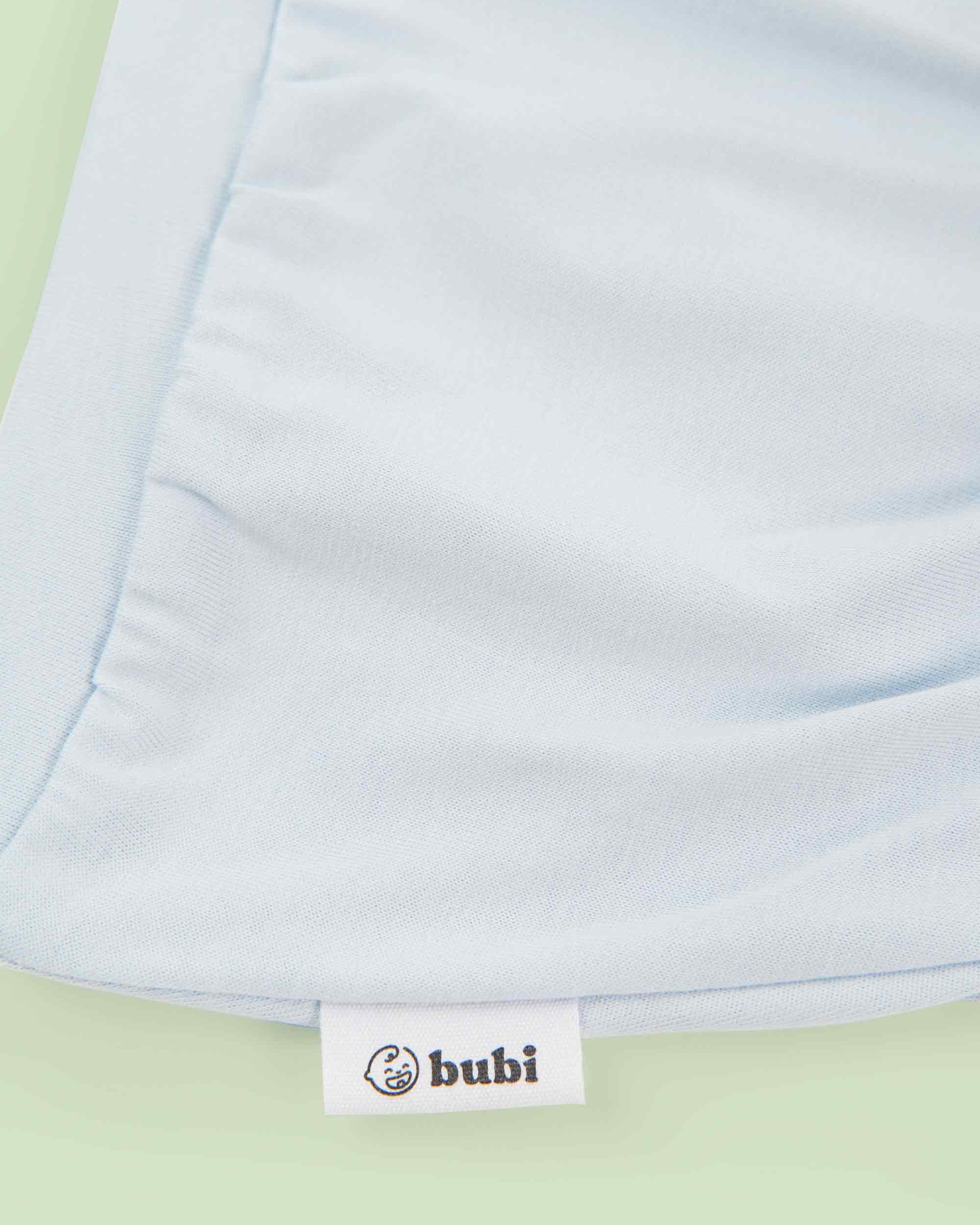 organic cotton baby shorts in blue - flat lay