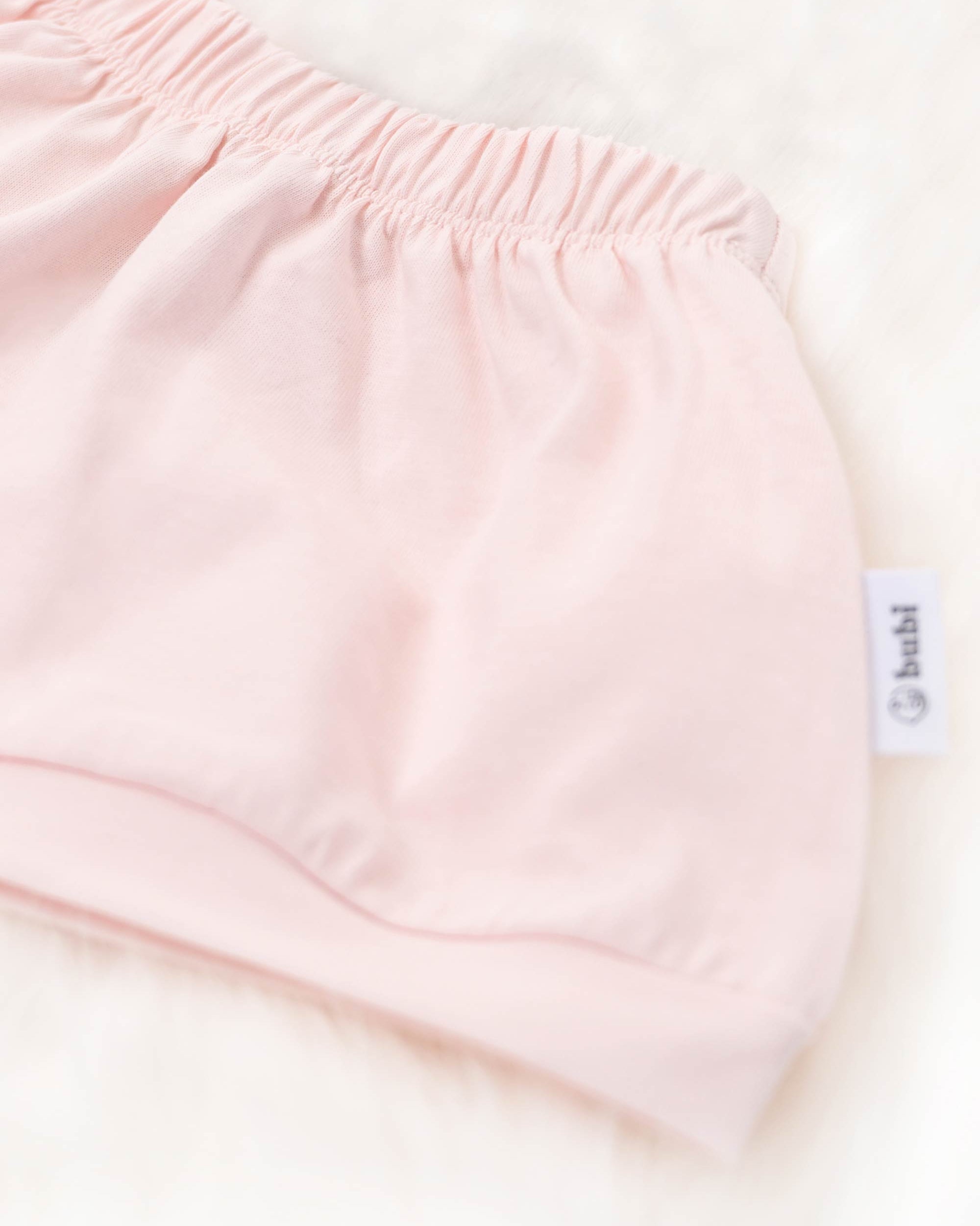 organic cotton baby shorts in pink - side view