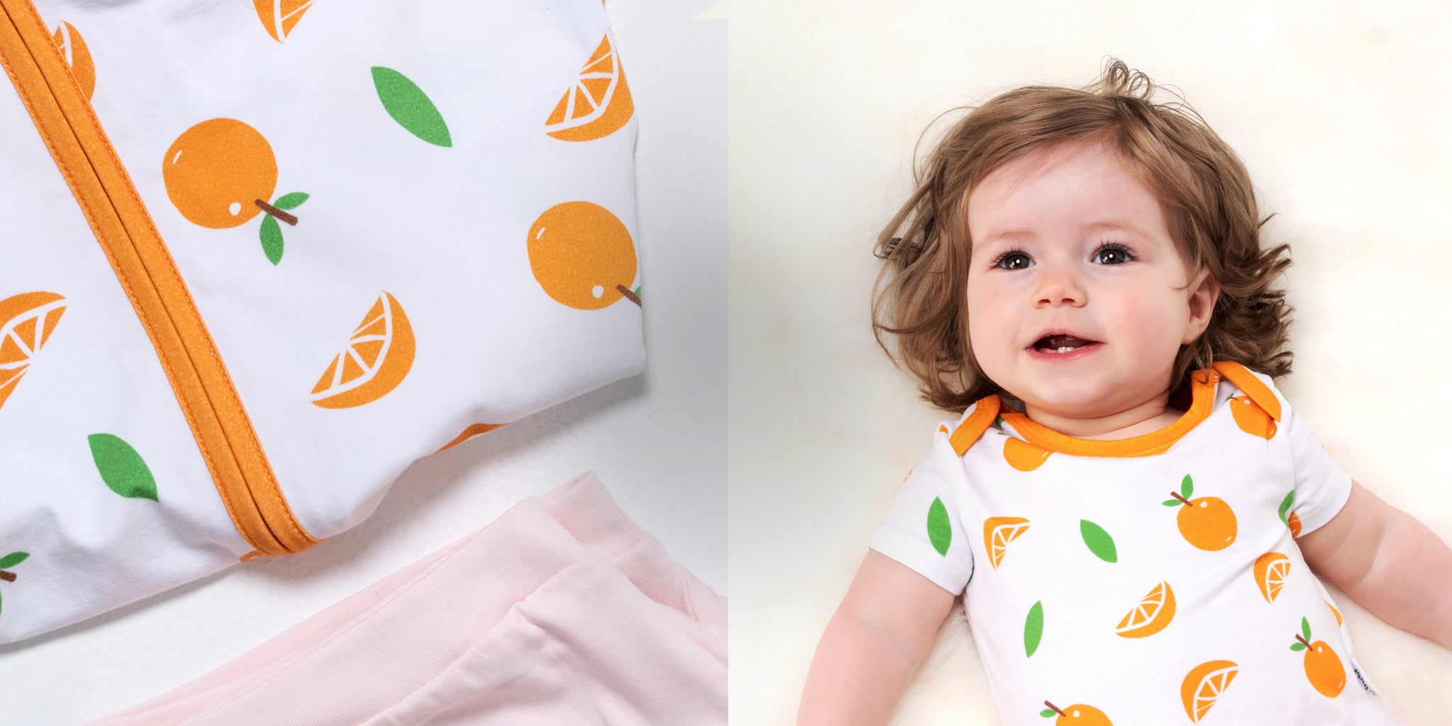 Baby wearing a onesie with orange pattern next to a bodysuit and pink shorts on a white background